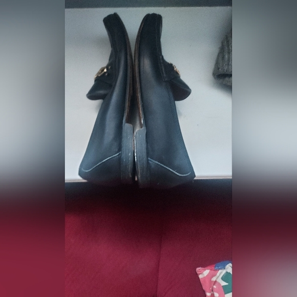 Salvatore Ferragamo Black and Gold Loafers with Signature Hardware. - Picture 7 of 9